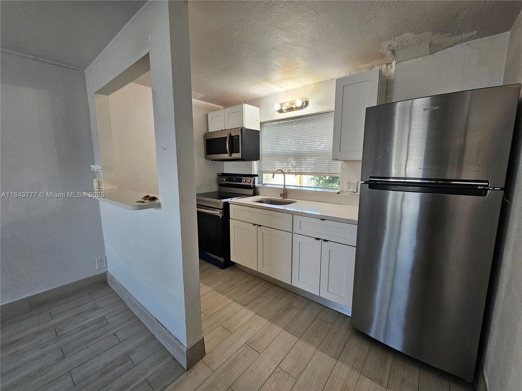 Photo of 26 SE 13th Ter #2, Dania Beach, FL 33004 (MLS # A11849777)