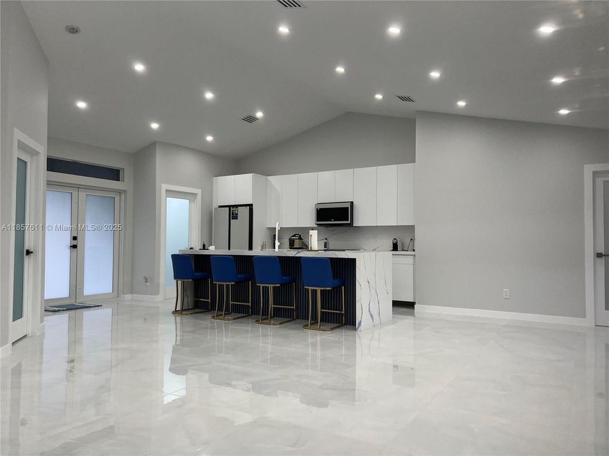 Welcome to your dream home in the heart of Cape Coral, Florida! This stunning single-family residence boasts three spacious bedrooms and a versatile den, perfect for a home office or playroom. With two beautifully remodeled bathrooms, this home combines modern elegance with functionalityEvery inch of this property has been thoughtfully updated with the latest contemporary styles, creating a welcoming atmosphere for families to thrive. The open-concept living area flows seamlessly into the dining space, making it ideal for entertaining or family gatherings.Set on a generous 10,018 sq ft lot, there's plenty of room to create your outdoor oasis, including the option to build your dream pool.