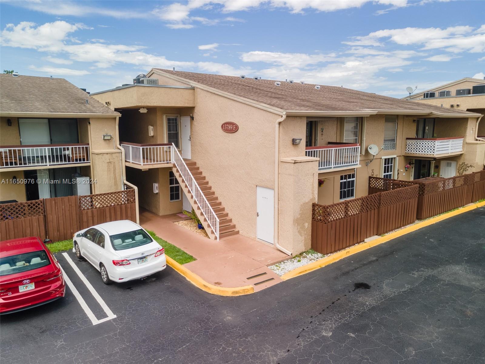 Discover this beautifully recently remodeled 1-bedroom, 1-bathroom corner unit in a secure gated community. Step into a bright, open living space featuring a modern kitchen with
white laminated cabinets, granite countertops, and an eat-in counter connected to a formal dining area. The spacious bedroom offers vinyl-laminated flooring, a walk-in closet, in unit Washer/Dryer, AC, and private storage of the balcony. Tiled throughout for easy maintenance, with stylish vinyl wood laminate in the bedroom. Enjoy assigned parking, guest parking, security patrol, and a refreshing pool. Minutes from restaurants, shops and golf course. Accordion shutters included!