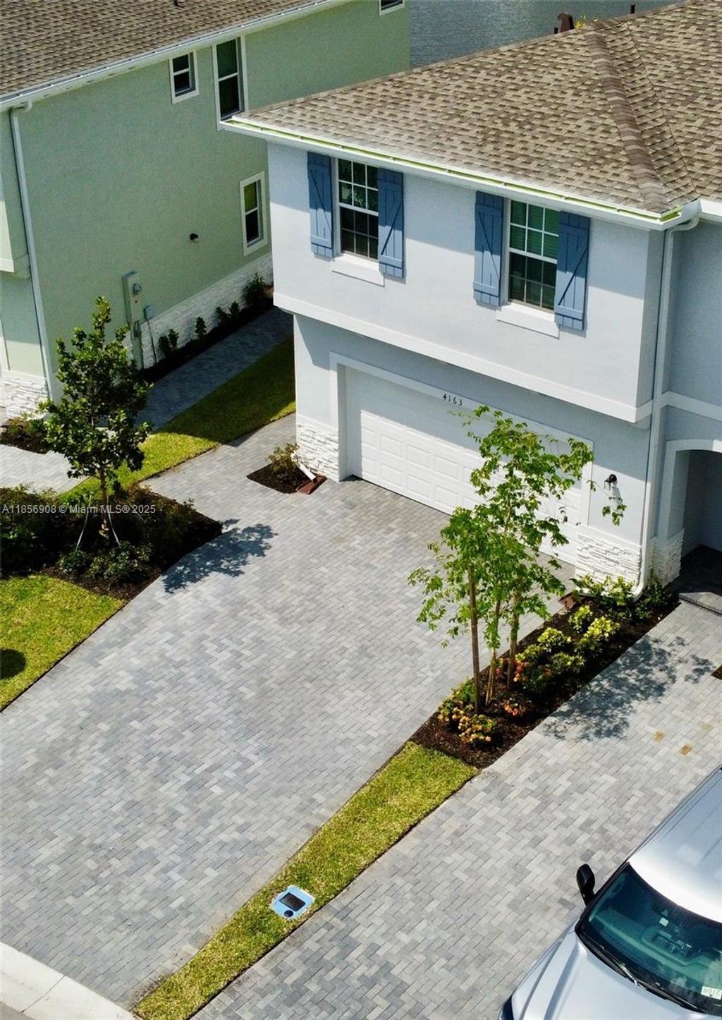 Photo of 4163 Lagoon Shore Dr #4163, Lake Worth, FL 33467 (MLS # A11856908)