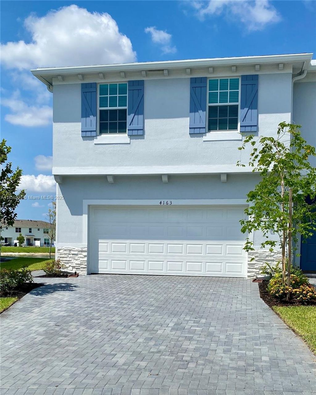 Photo of 4163 Lagoon Shore Dr #4163, Lake Worth, FL 33467 (MLS # A11856908)
