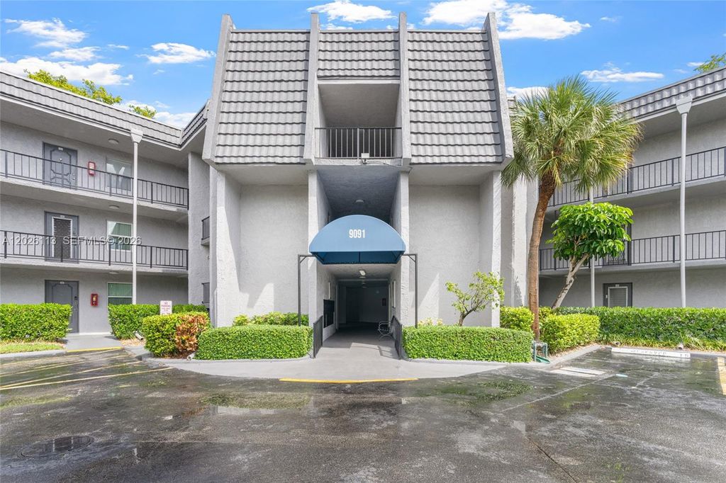 Photo of 9091 Lime Bay Blvd #304, Tamarac, FL 33321 (MLS # A12026113)