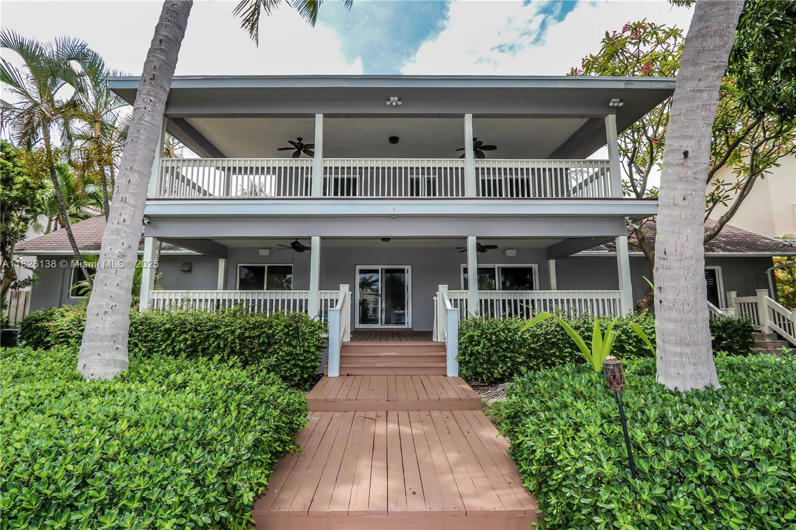 Welcome to your own paradise in this one-of-a-kind waterfront retreat. Nestled along a wide deep water canal, this 5-bed, 2 bath + 2 half bath home offers over 3,500 sq ft of serene living space. Ideal for boat lovers, this home features a 60’ deep water dock with electric and lighting, plus a wide turnaround for easy navigation. Inside, you'll find a bright coastal-inspired interior that flows effortlessly to two large covered porches—perfect for outdoor dining. The kitchen features 2 refrigerators, 2 dishwashers, granite counters, a wine cooler, double ovens, and 2 sinks—making it ideal kosher kitchen setup. The oversized master suite upstairs is complete with its own private deck overlooking the water, an ensuite bath, and a spacious walk-in closet. Plus 2 addtl rooms for office/gym.