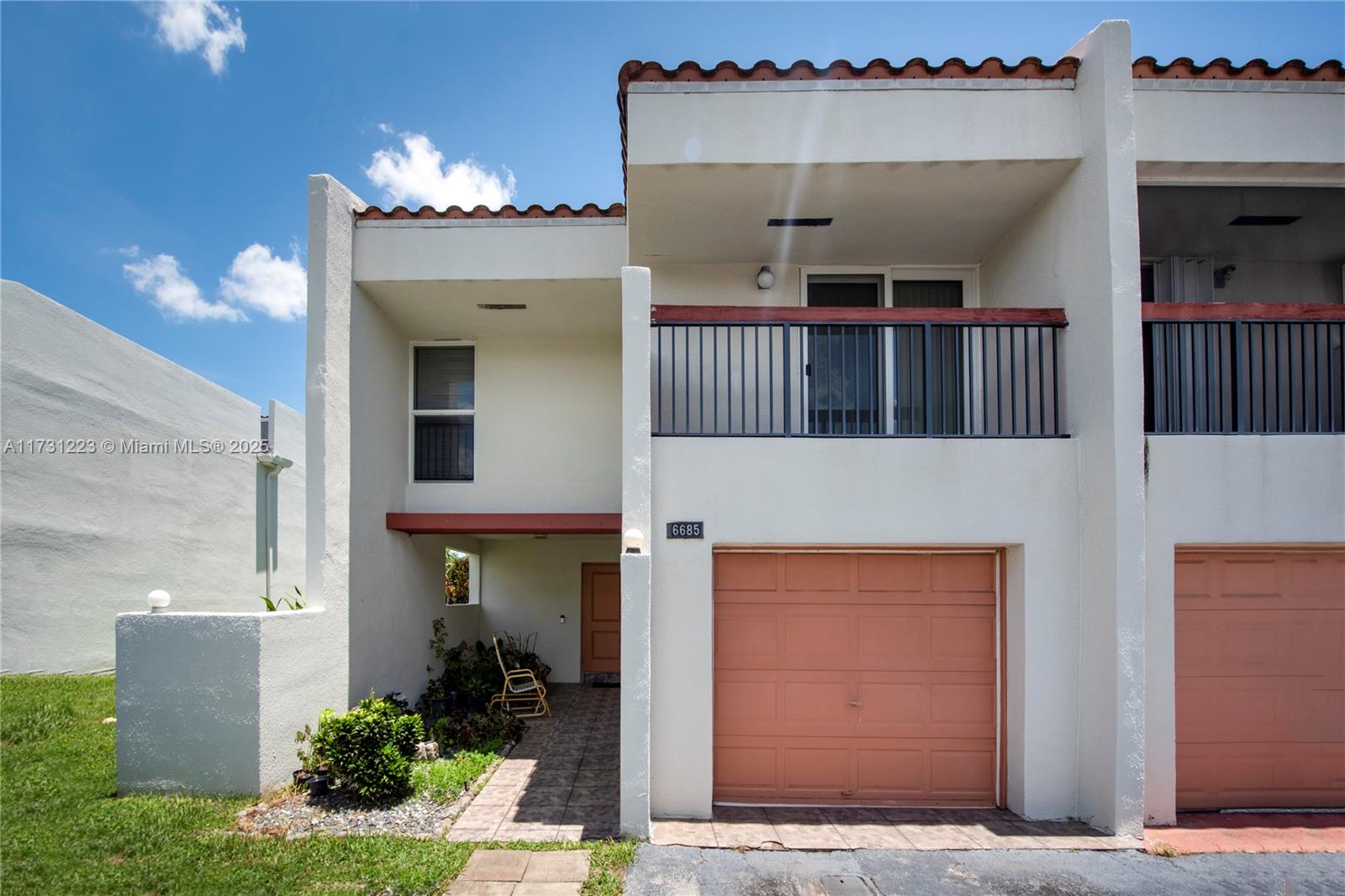 Step into this stunning 3-bedroom, 2.5-bathroom corner unit in a secure, family oriented gated community. Recently renovated, this home boasts a brand-new A/C, tankless water heater, and impact windows for peace of mind. Modern upgrades include smart mirrors in both full bathrooms and sleek custom zebra roller shades throughout. The thoughtfully designed interior features engineered wood in the living areas, laminate flooring in the bedrooms, and elegant tile in the kitchen and bathrooms. Perfectly situated near shopping centers and major roads, this home combines style, convenience, and modern living.