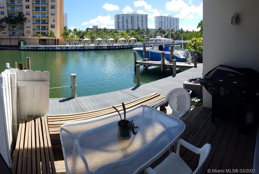 Exclusive private island in Sunny Isles Beach. Boat Owners!!! dock your boat (30+Ft)in DEEDED DOCK  and bay bottom. NO BRIDGES to the ATLANTIC  OCEAN. Across the street from the beach. High tide in dock 7Ft, and Low 3Ft. With the best 2 option that you can be offer: either walk to the ocean or use your Boat and be in open ocean very fast.  2 Story 3 Bed/2.5 Bath Town house over the water, with very high celling, is located at the entrance of the Island, and the beach is at walking distance, 2 Pools, Exercise room, tennis, community room, racket court Elementary School: Norman S. Edelcup (Pk/8th) Open Terrace between the 2 front bedrooms, no open permits or fines. One car garage but plenty of parking. Owner realtor.