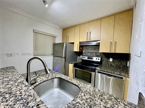 Photo of 811 NE 14th Pl #4, Fort Lauderdale, FL 33304 (MLS # A12091570)