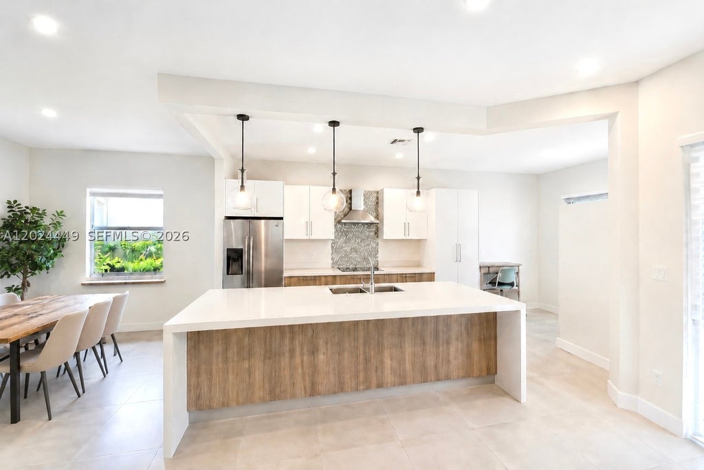 Photo of 4486 W Whitewater Ave, Weston, FL 33332 (MLS # A12024449)
