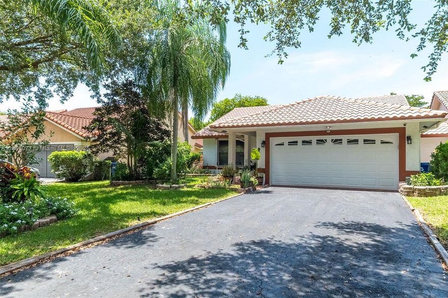 Spacious 4BR/2BA Coral Springs home with vaulted ceilings, tile throughout & upgraded kitchen featuring granite, wood cabinets & stainless steel appliances. Open kitchen, dining & living area with bedrooms separated for privacy. Enjoy a screened patio with private pool, built-in grill, fire pit & large yard. Brand new pool pump, AC just serviced with new coils & washer only 1 yr old. Driveway fits 4 cars plus 2 in garage. Walk-in closets, ample storage & CBS construction. Minutes to top schools, parks, shopping & dining. Perfect for families who love to entertain, relax by the pool & enjoy South Florida living. Excellent opportunity to own a well-maintained home in a highly desirable community with no HOA & easy access to highways for commuting. Call me for an exclusive​​‌​​​​‌​‌​​​‌‌​​​‌‌‌​​‌​​‌‌​​​​ tour!