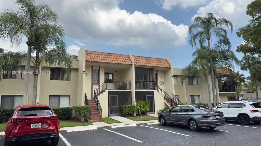 Photo of 410 Lakeview Dr #103, Weston, FL 33326 (MLS # A11948974)