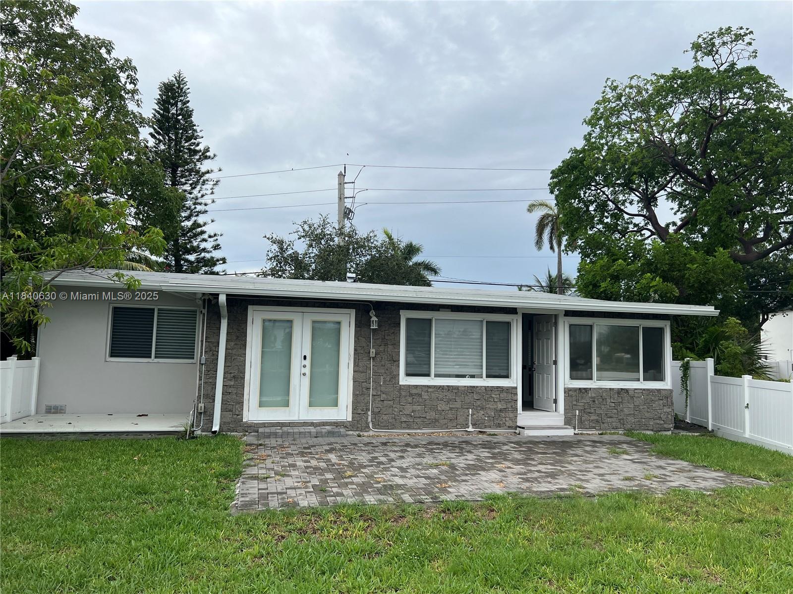 Incredible find! A Boat owner's dream location! This completely renovated 3 bedroom, 2 bath home boasts 51' of bulkhead plus a brand new 25' dock! The desirable Lauderdale Harbors provides easy access to the ocean and is the perfect place to call home!this updated gem in Rio Vista island community of Lauderdale Harbors offers an exquisite location. Enjoy sunrises on the water where you can utilize the dock for small watercraft and enjoy ocean access. Private drive and pretty fenced yard, pretty wood flooring, updated bathrooms, plenty of storage.