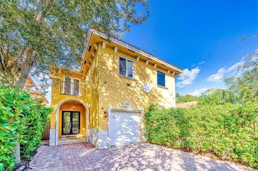 Incredibly - reconfigured Mediterranean style townhome with an open floorplan that gives the feel of new construction at a much lower cost!! Unit features include marble & wood flooring throughout, Quartz countertops, stainless steel appliances, remodeled bathrooms & spacious back patio/yard. The kitchen opens up to both the formal living & dining areas plus the family room - this is a must see!!