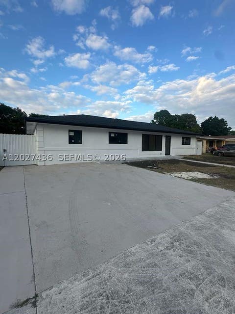 Photo of 2041 NW 190th Ter, Miami Gardens, FL 33056 (MLS # A12027436)