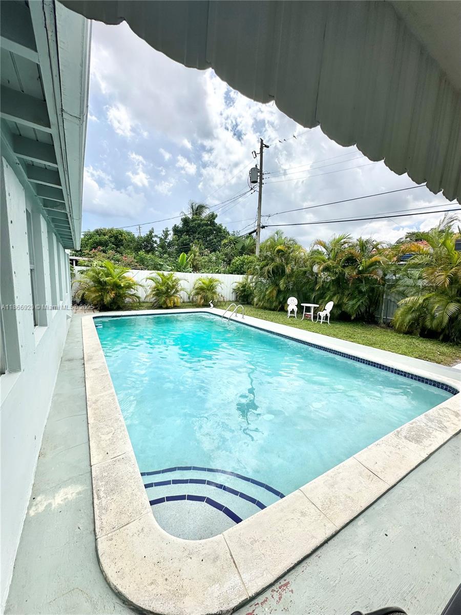 Great opportunity in the heart of Miami with 3-bedroom/3-bathroom home, this property has been thoughtfully upgraded. The garage was converted into a third bedroom and second bathroom. A bedroom features a private en-suite bathroom, and a half-bath in the backyard—perfect for poolside use. Enjoy a large pool and spacious patio with plenty of room for entertaining for your guests. Centrally located near major roads, shopping, and the airport. Ideal for a multigenerational family, a first home or as an investment property!