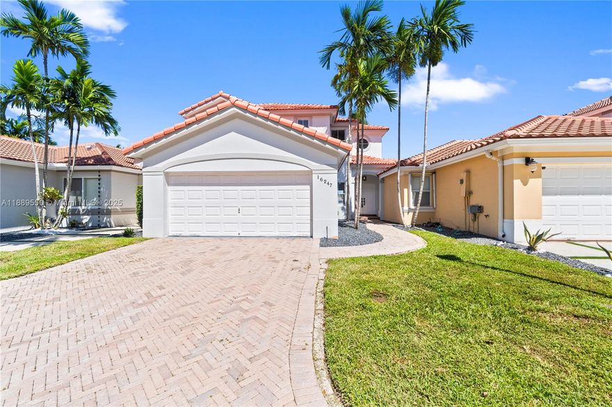 Welcome to this renovated lakefront residence in the gated community of Melrose Point at Park Lakes. This 4-bed, 3-bath home features soaring ceilings, expansive windows, and panoramic lake views. The open layout highlights a new designer kitchen with quartz counters, sleek cabinetry, and stainless steel appliances. Bathrooms include modern finishes, frameless glass showers, and custom vanities. A first-floor bedroom with full bath is ideal for guests. Upstairs, the primary suite offers a spa-inspired bath and serene water views. Additional features include porcelain tile flooring, wood accents, and a 2-car garage with laundry area. Private patio overlooking the lake and fountain — perfect for entertaining or sunsets. Community amenities include pool, recreation facilities, and security.