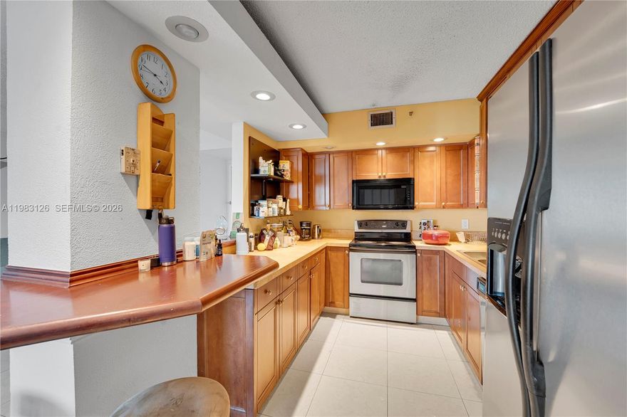 Beautiful 2 Bedroom, 2 Bathrooms at Hillcrest BUILDING 20, The unit has all impact windows and balcony, Remodeled, Open kitchen. Tenant in place. Building lobby attended, Gym, Pool, Tennis Courts , Extra Storage. Great location near Shops, Restaurants, and Orange Brooks golf Course. 1 assigned parking space. The Building has reserves and the certification is almost done. Well maintained and managed building.