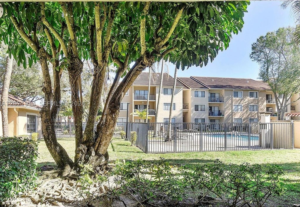 Photo of 9188 W Atlantic Blvd #1513, Coral Springs, FL 33071 (MLS # A12071914)