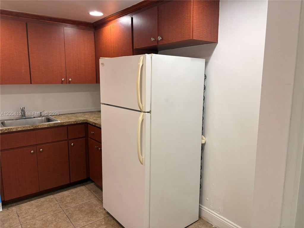 Photo of 4168 Inverrary Dr #408, Lauderhill, FL 33319 (MLS # A12004157)