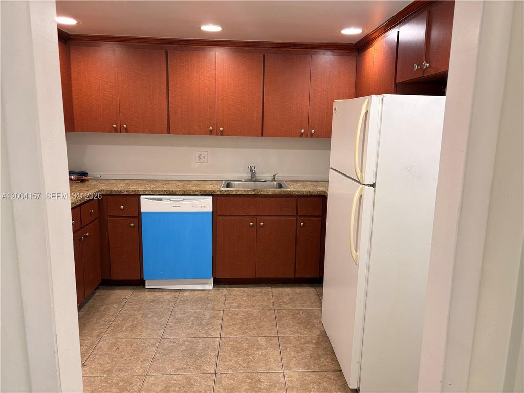 Photo of 4168 Inverrary Dr #408, Lauderhill, FL 33319 (MLS # A12004157)
