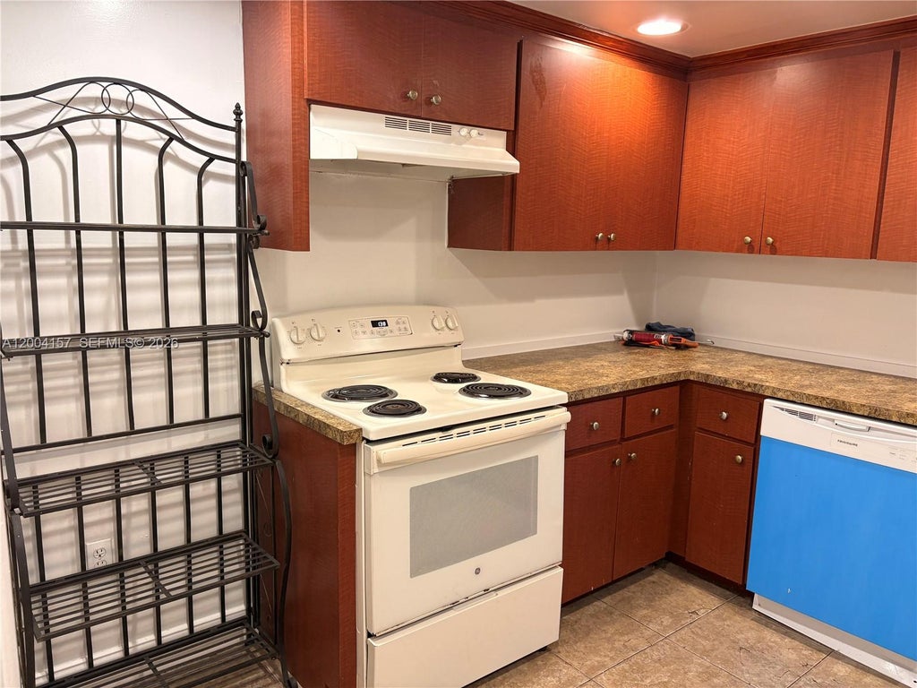 Photo of 4168 Inverrary Dr #408, Lauderhill, FL 33319 (MLS # A12004157)