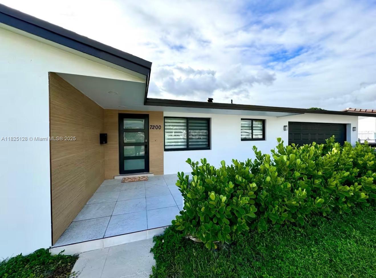 Fully Renovated! This Beautiful 3 bedrooms, 2 bathrooms home offers the perfect blend of modern design and luxurious living. Completely remodeled with high-end finishes throughout, this house features an open-concept layout, a sleek gourmet kitchen, and spacious living areas filled with natural light. Owner has plans approved by the City of Hialeah to convert the garage in a 1 bedroom and 1 bathroom. Step outside to your private backyard oasis with a sparkling pool overlooking a serena lake, perfect for relaxing. Located in a very quiet neighborhood, this move-in-ready home is a true gem for those seeking comfort, elegance and modernity. Prime location with easy access to Palmetto Expressway, Florida's turnpike and I-75. Schedule your private showing today!