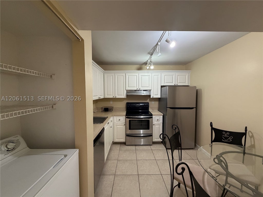Photo of 711 N Pine Island Rd #121, Plantation, FL 33324 (MLS # A12061513)