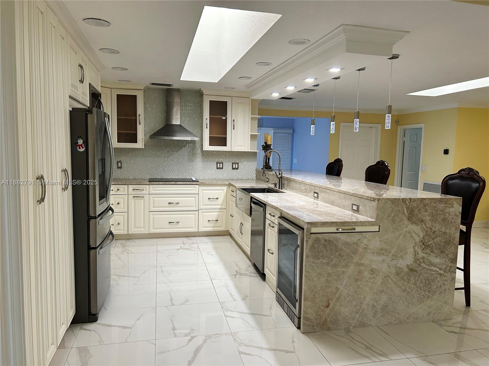 Enjoy luxury living in this beautifully upgraded Coral Springs home featuring a private pool and basketball court. Inside, you’ll find two large living areas, beautiful tile flooring, and a modern kitchen with stainless steel appliances. The home offers 3 full bathrooms, a huge master suite with sitting area, and skylights that bring in natural light. With ample parking, a 2-car garage, and hurricane protection, this home is both comfortable and convenient. Perfect for those seeking space, style, and a touch of luxury in a quiet neighborhood. Flexible leasing options available, including short-term rentals, corporate leases, and accommodations for travel nurses or executives. An ideal opportunity as we approach the holiday season.