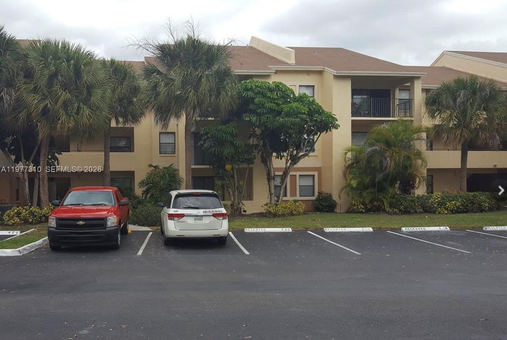 Photo of 9999 Summerbreeze Dr #420, Sunrise, FL 33322 (MLS # A11977310)