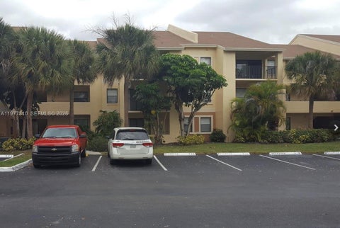 Photo of 9999 Summerbreeze Dr #420, Sunrise, FL 33322 (MLS # A11977310)