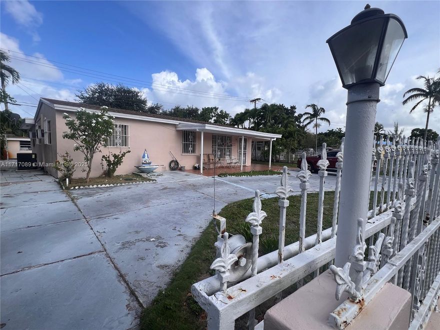 Come and see this single story home located in a great Hollywood area.  This home features 4 beds, 2 baths with 1380 Sq/Ft under air, family room and a circular driveway with a large carport and a large back yard seating in a corner lot with new roof done in 2022, new a/c & water heater done in 2023. Ideal home for any family with your personal touch this can be the home you and your family have always dreamed of! Located in a great residential area with everything you need nearby from shopping, restaurants, daycare, major roads and turnpike!. Don't miss out on this grand opportunity to buy a great home with GREAT POTENTIAL ***NO HOA!!!***