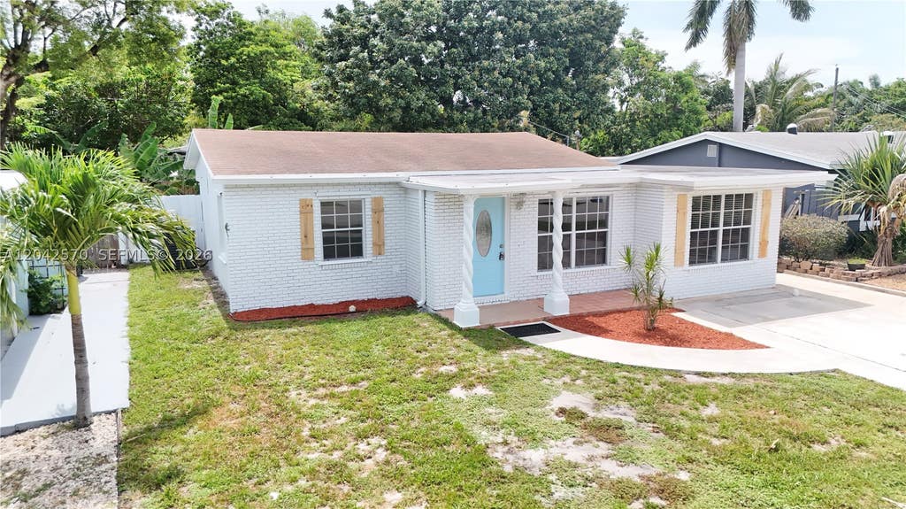 Photo of 5217 NE 2nd Ave, Oakland Park, FL 33334 (MLS # A12042570)