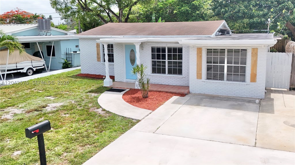 Photo of 5217 NE 2nd Ave, Oakland Park, FL 33334 (MLS # A12042570)