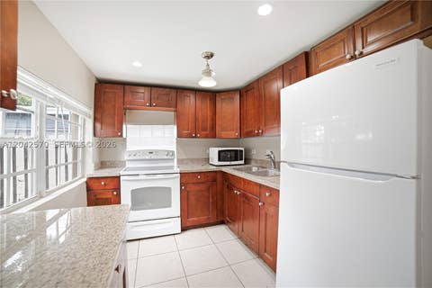 Tiny photo for 5217 NE 2nd Ave, Oakland Park, FL 33334 (MLS # A12042570)