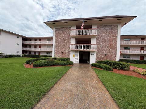 Photo of 1100 Hillcrest Court #111, Hollywood, FL 33021 (MLS # A12029655)