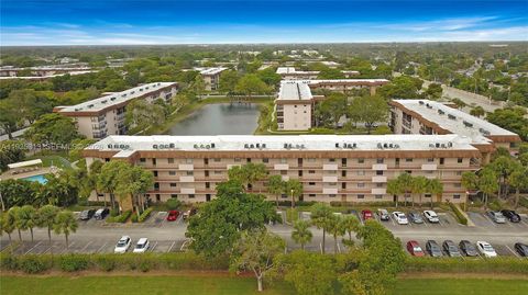 Photo of 4930 E Sabal Palm Blvd #306, Tamarac, FL 33319 (MLS # A11935313)