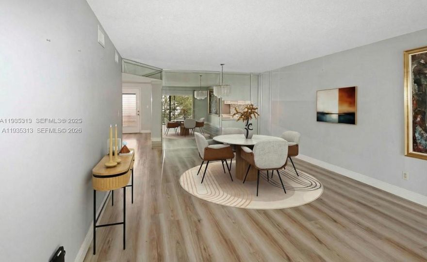 Welcome home to this stunning, totally remodeled 2/2 condo in a desirable 55+ community! Spanning a spacious 1,270 Sq Ft, this unit features beautiful laminate flooring throughout and a modern kitchen equipped with quartz countertops. Relax and enjoy the serene lake views right from your window. Convenience is key with an assigned parking space and a low monthly maintenance fee with NO pending special assessments. The community offers resort-style living with a pool, gym, and plenty of amenities to keep you active. Move-in ready and waiting for you!