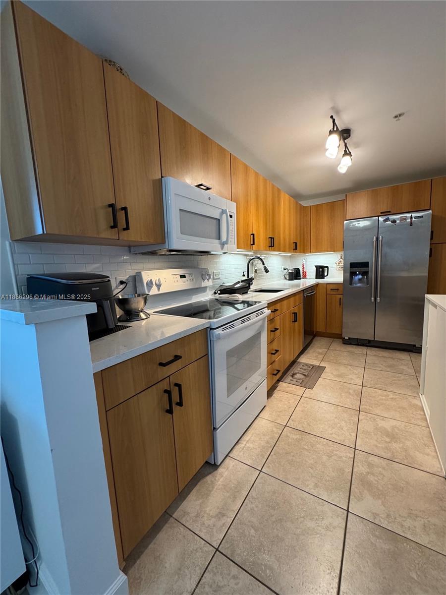 TREASURES ON THE BAY II C - Residential