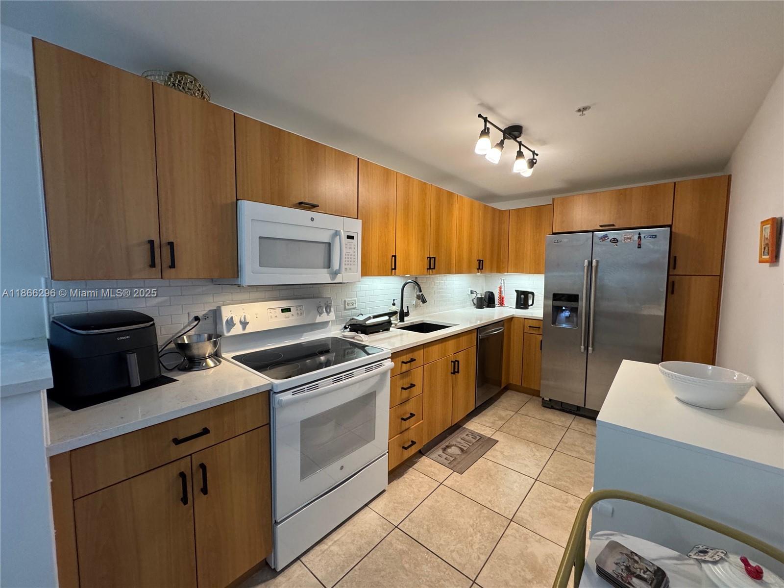 TREASURES ON THE BAY II C - Residential