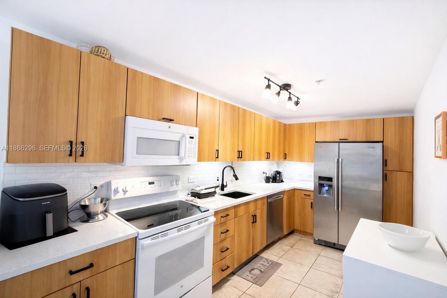 TREASURES ON THE BAY II C - Residential