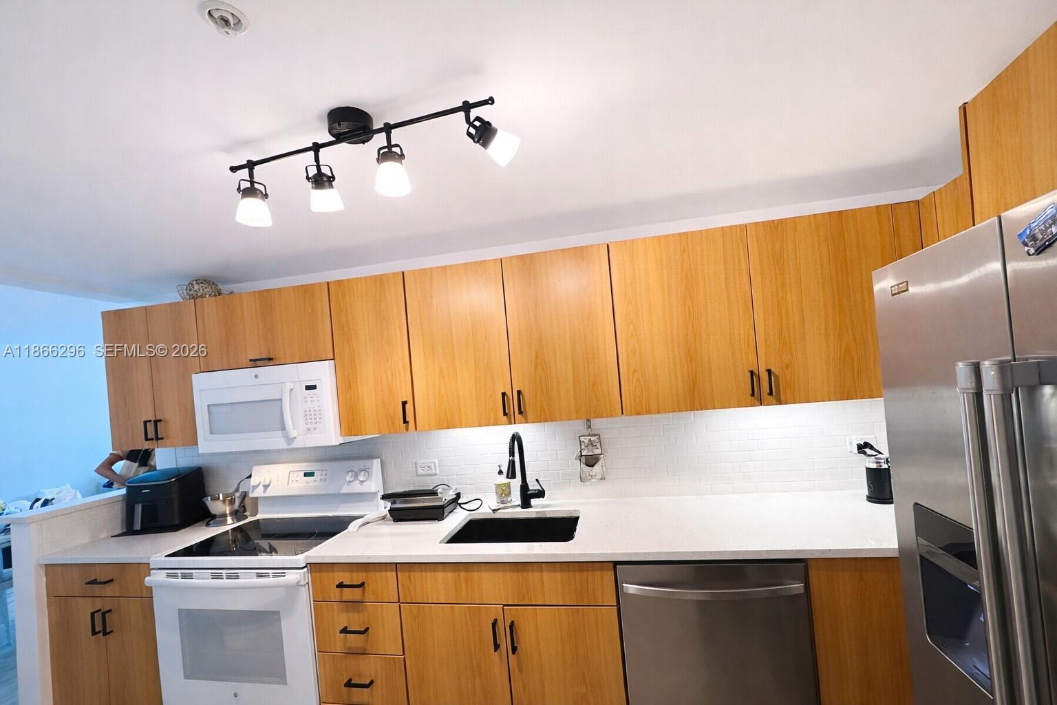 TREASURES ON THE BAY II C - Residential