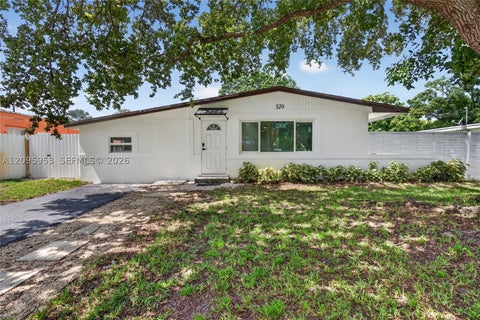Photo of 320 N 70th Ter, Hollywood, FL 33024 (MLS # A12095953)