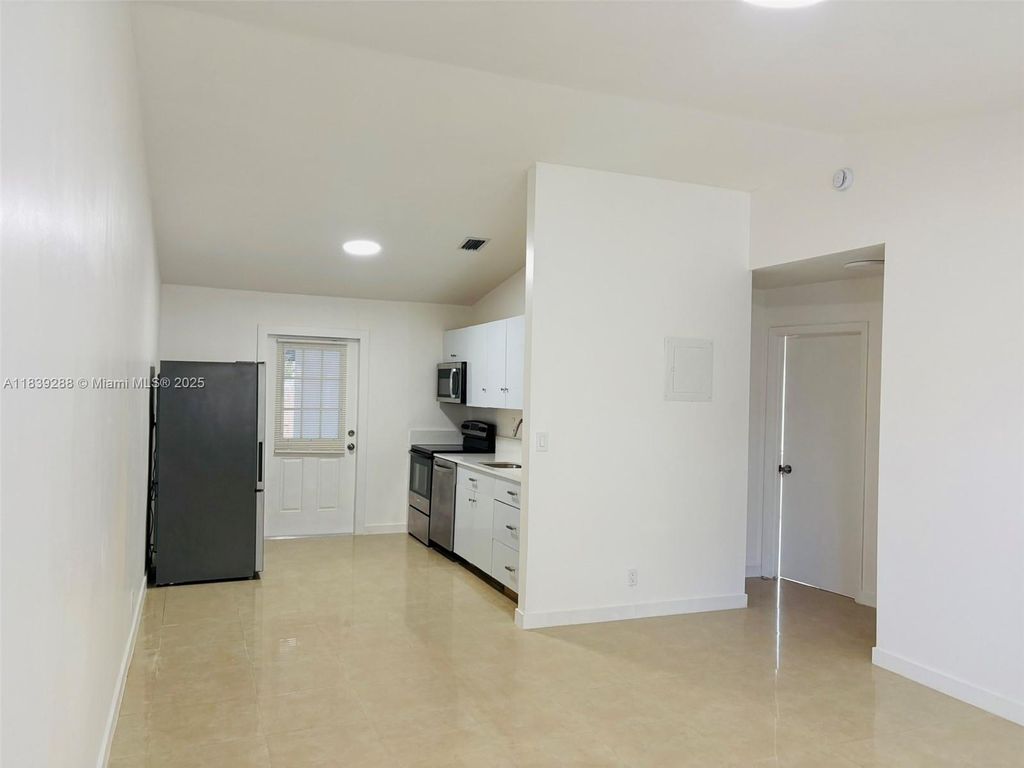 Photo of 4710 NW 3rd Ter, Deerfield Beach, FL 33064 (MLS # A11839288)