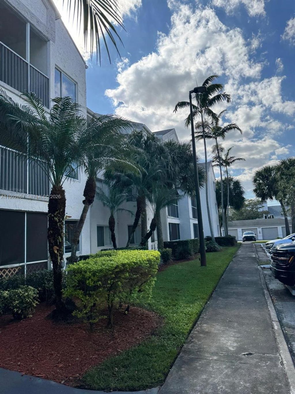 Photo of 5760 Rock Island Rd #304, Tamarac, FL 33319 (MLS # A11992867)