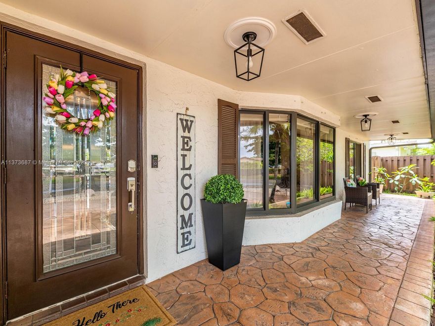 This highly sought after Pembroke Lakes Pool Home has been meticulously cared for. Impact windows in the front of the house with accordion shutters in the back & sides. Granite countertops & backsplash in the kitchen, newly  remodeled bathrooms. Plenty of parking in the large circular driveway. Enjoy your oversized covered patio with family & friends. Plenty of room for fun in the pool, spa or just relaxing. Garage was converted by developer and is up to code. No HOA with close proximity to great schools  This contemporary open concept gem of a home will not last. Schedule your showing  today!