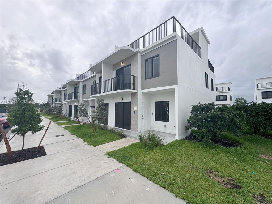 Corner townhouse w/ 4 bedrooms and 3 bathrooms with 2,153sqft. Features porcelain tile throughout, upgraded finishes, hurricane windows/doors, and plenty of natural light. Sheer and blackout shades in all bedrooms. Closets have built-ins, including an oversized master closet. Includes 2 parking spots, in-home washer and dryer, and ample guest parking. Personal EV/Tesla charger. Third-story outdoor terrace with water and electricity hookups for outdoor living and entertainment. Community Name: Grandville by ONX