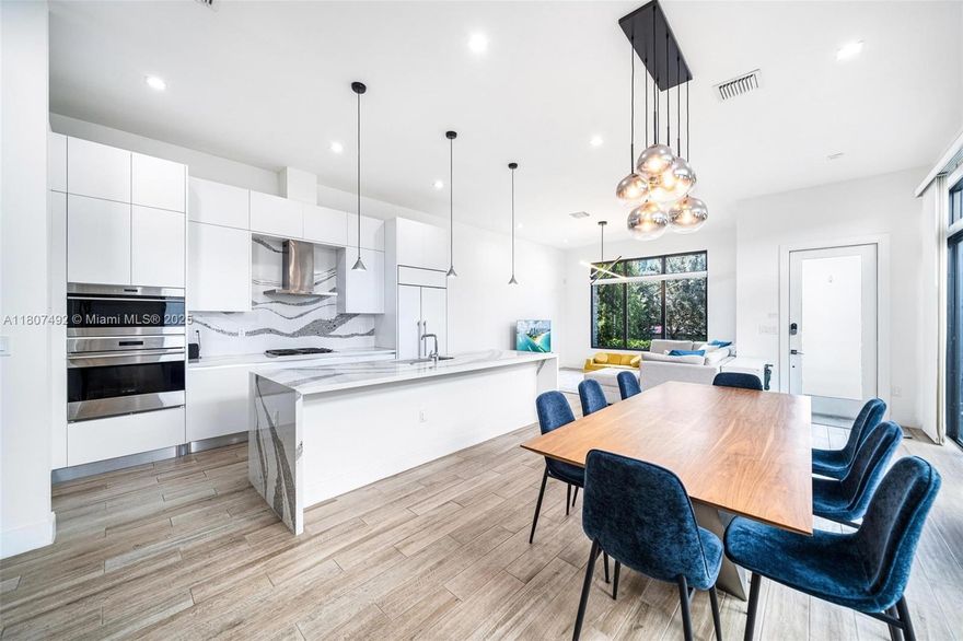 Experience modern living in the heart of Downtown Doral. This spacious 3-bedroom + den, 3.5-bath two-story residence is located in the desirable Canarias at Doral community. The open-concept layout features a private patio, two-car garage, and an additional driveway space for added convenience. The expansive primary suite includes a large walk-in closet with custom built-ins and dual sinks. Residents enjoy access to the exclusive Canarias Clubhouse, featuring resort-style amenities such as a gym, basketball court, pool, and playground. All just steps from Downtown Doral’s top-rated schools, shopping, and dining.