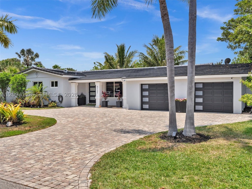 Photo of 5121 NE 30th Ter, Lighthouse Point, FL 33064 (MLS # A12094128)
