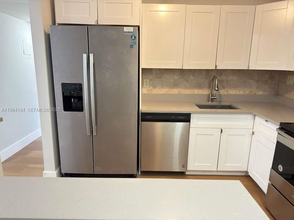 Photo of 4304 NW 9th Ave #1-2C, Deerfield Beach, FL 33064 (MLS # A11984194)