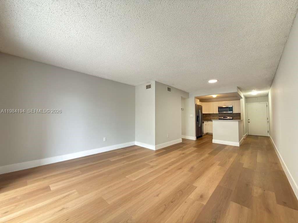 Photo of 4304 NW 9th Ave #1-2C, Deerfield Beach, FL 33064 (MLS # A11984194)