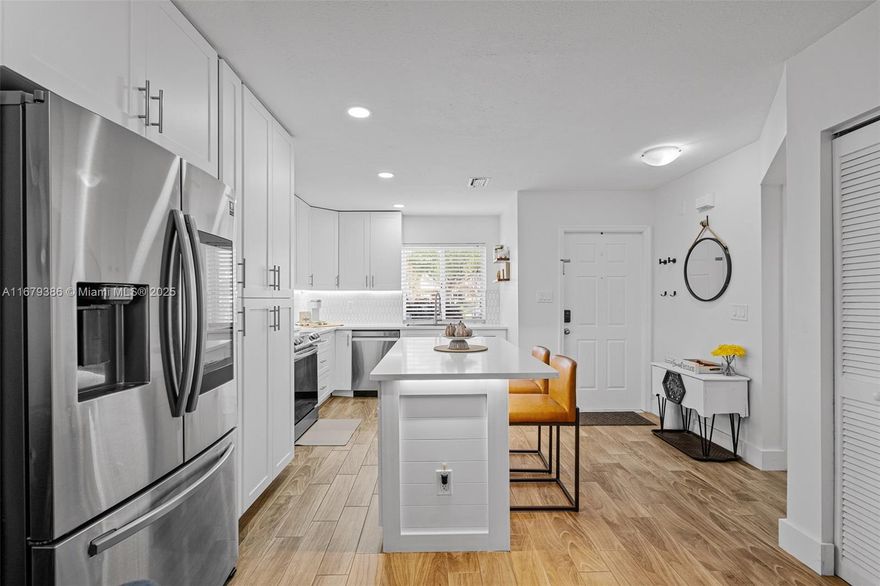 Exquisite 3-bedroom, 2.5-bath townhome! It offers 1,361 sqft of beautifully designed living space in Chapel Trail. The heart of the home is a chef’s kitchen, that boasts white cabinetry, quartz countertops & stainless steel appliances, flowing effortlessly into the open-concept living area. Upstairs, discover premium wood laminate flooring & fully updated baths. Step outside to a private screened porch for your enjoyment. 2 dedicated parking spaces & ample guest parking. Community amenities include a pool overlooking the lake, gym, game room, tennis courts, and party room. HOA covers roof, ext painting, lawn maint, security, cable & high-speed internet. High-end finishes, natural light, and an exceptional layout make this townhome a true gem. Seller willing to pay assessment in full.