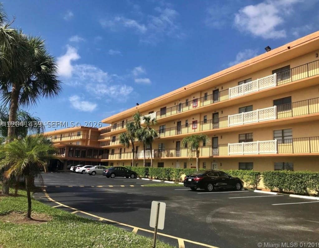 Photo of 9273 SW 8th St #311, Boca Raton, FL 33428 (MLS # A12041439)